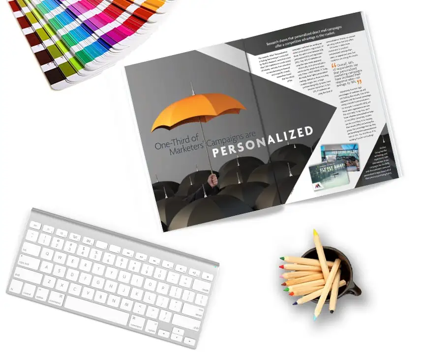 Color palette, keyboard, magazine flatlay